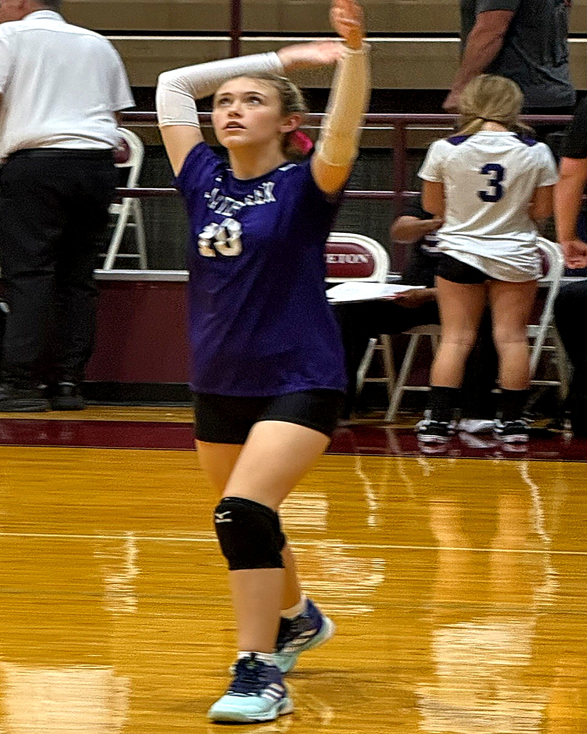 Jordan Young holding volleyball